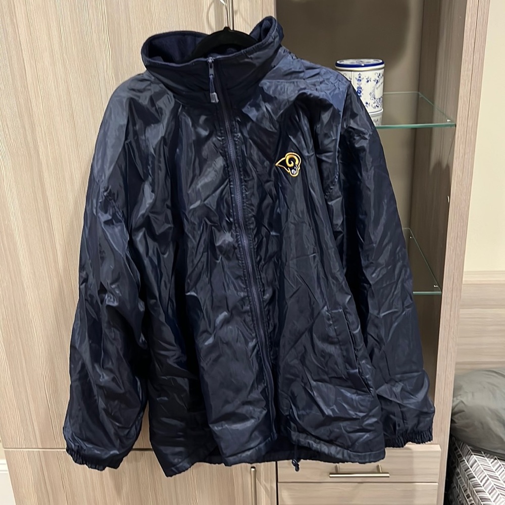 Vintage navy rams windbreaker with zippable collar.